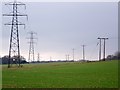 Pylons across the landscape near Pittleworth in SO20 6NA