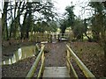 Swollen river and footbridges, River Swift in LE17 4JP