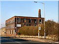 Disused Mill on Bury Road in BL2 6QH