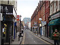 View down Fashion Street from Brick Lane in E1 6BJ