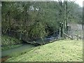 Stream and culvert under railway embankment, Shawell in LE17 6AS
