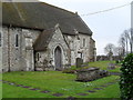 Approaching the church porch at  St Mary, East Worldham in GU34 3AW