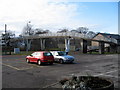 Footbridge and car park at Alness station in IV17 0QL
