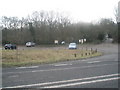 Looking across Main Road towards the car park for Kingsley Pond in GU35 9NG