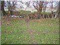 Footpath junction near Chennell Park in TN30 6UJ