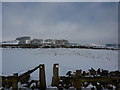 Stile and path across snow fields in Green Fairfield