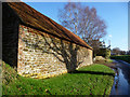 Tree shadow on farm building, Dumpford in GU31 5JR