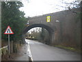 Railway bridge over Warehorne Road in TN26 2DY