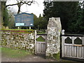 Gate entrance to St Laurence church in GU28 9ET