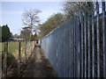 Footpath beside the railway embankment, Llanishen, Cardiff in CF14 0RH