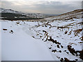 Snowdrifts by the Lon Raagil in IV51 9UX