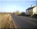 The Morridge Side milepost in its setting on the A523 in Bradnop