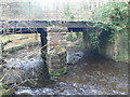 Disused railway bridge in The Dingle in LL77 7QA
