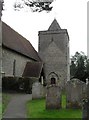 The church tower at St James, Stedham in GU29 0NG