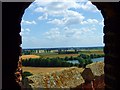 View of RAF Coningsby taken through a top turret window from Tattershall Castle in Coningsby