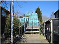 Mildly famous footbridge over Metrolink lines. in M32 0SS
