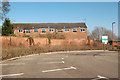 Daventry: disused houses behind car park in NN11 4RB