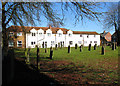 Cottages adjoining St Mary's churchyard in PE32 1EB