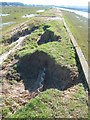 Damage to Potman's Heath Channel Flood Wall in TN30 7PT