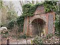 Disused railway bridge with chalk ball at West Dean in PO18 0RB