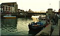 Weymouth: Sun sets over the Town Bridge in DT4 0DS