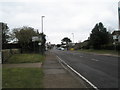 Looking south-west down Chichester Road in PO20 0LX