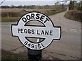 Iwerne Minster: detail of Peggs Lane signpost in DT11 8RA