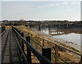 Riverside cyclepath approaching railway bridge in NP19 7LN