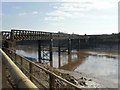Railway bridge viewed from cycleway in NP19 7LN