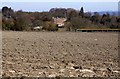 Looking over a ploughed field to Ardington House in Ardington