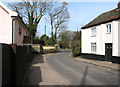 Watton Road past cottages in Shropham in Shropham