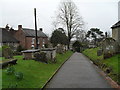 Looking towards the lych gate at St Mary, Pulborough in RH20 1DP