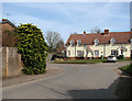 Terraced cottages by the junction of Sallow Lane and Chalk Lane in NR17 1DT