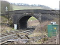 Railway bridge at entrance to Tarmac's Tunstead quarries in Limestone Peak Ward