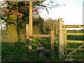 A stile and public footpath in CM3 4BE