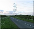 Electricity wires cross the B1176 in PE9 4LQ