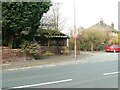 Derelict trolley bus shelter on Moss Bank road in WA10 6PU