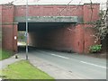 East Lancs Road crosses ex railway bridge in WA11 7DW