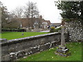 Looking from the churchyard at St Giles, Graffham towards the infant school in GU28 0NJ