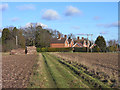 Farmland, track and cottages, Mortimer West End in RG7 3UD