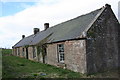 Derelict Broonknowe Cottages in DD9 6SJ
