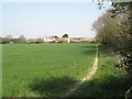 Looking from the footpath junction towards the village in PO18 0DE