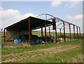 Derelict barn beside bridleway to Upper St Dennis in Honington