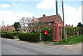 Postbox and K6 telephone box in Church Road in PE34 4SR