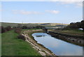 The River Cuckmere above Exceat Bridge in BN25 4AB