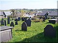The north-eastern corner of Eglwys St Cawrdaf's churchyard in LL53 6BF