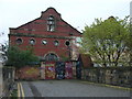 Old Shrubhill tram depot from Dryden Terrace in EH7 5LG