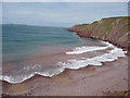 The waters of Westdale Bay turn pink in SA62 3RL