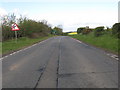 A697 heading towards it junction with the A698 in TD12 4LW