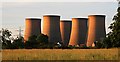 Cooling towers dwarf the houses at High Marnham in High Marnham